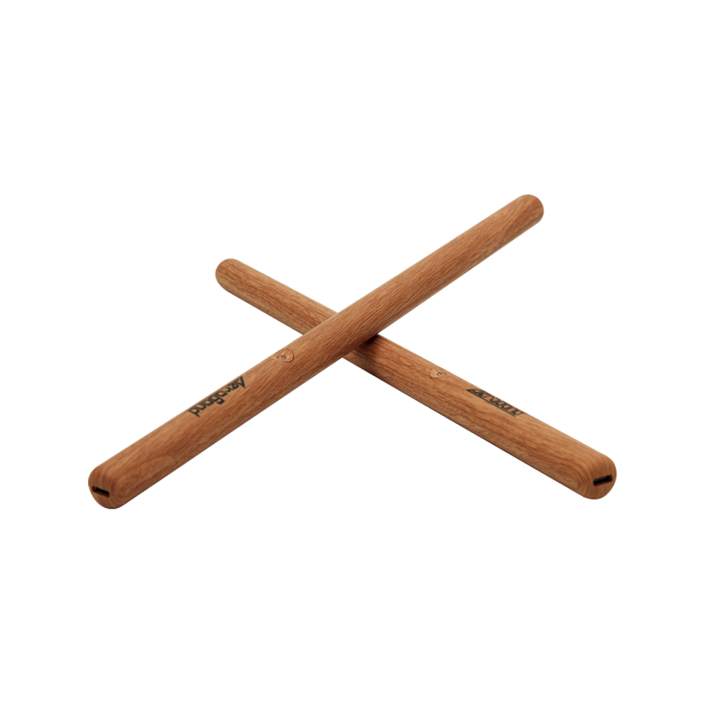 Two PocketDrum 2 Max virtual drumsticks made of light brown wood crossed on a white background.