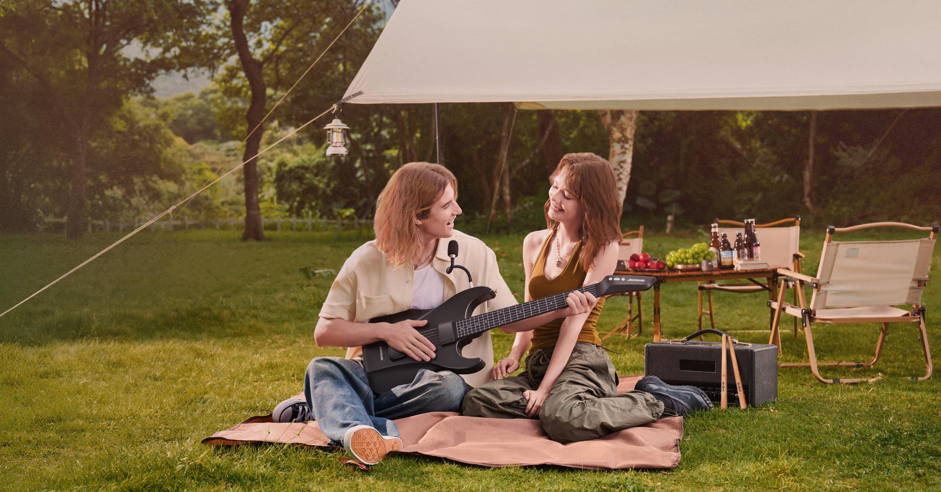 A man is playing the Aeroband Guitar